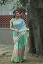 Elegant Linen Saree with Gold Jari Patta & All-Over Digital Print | With Matching Blouse - Mint Aqua Green image